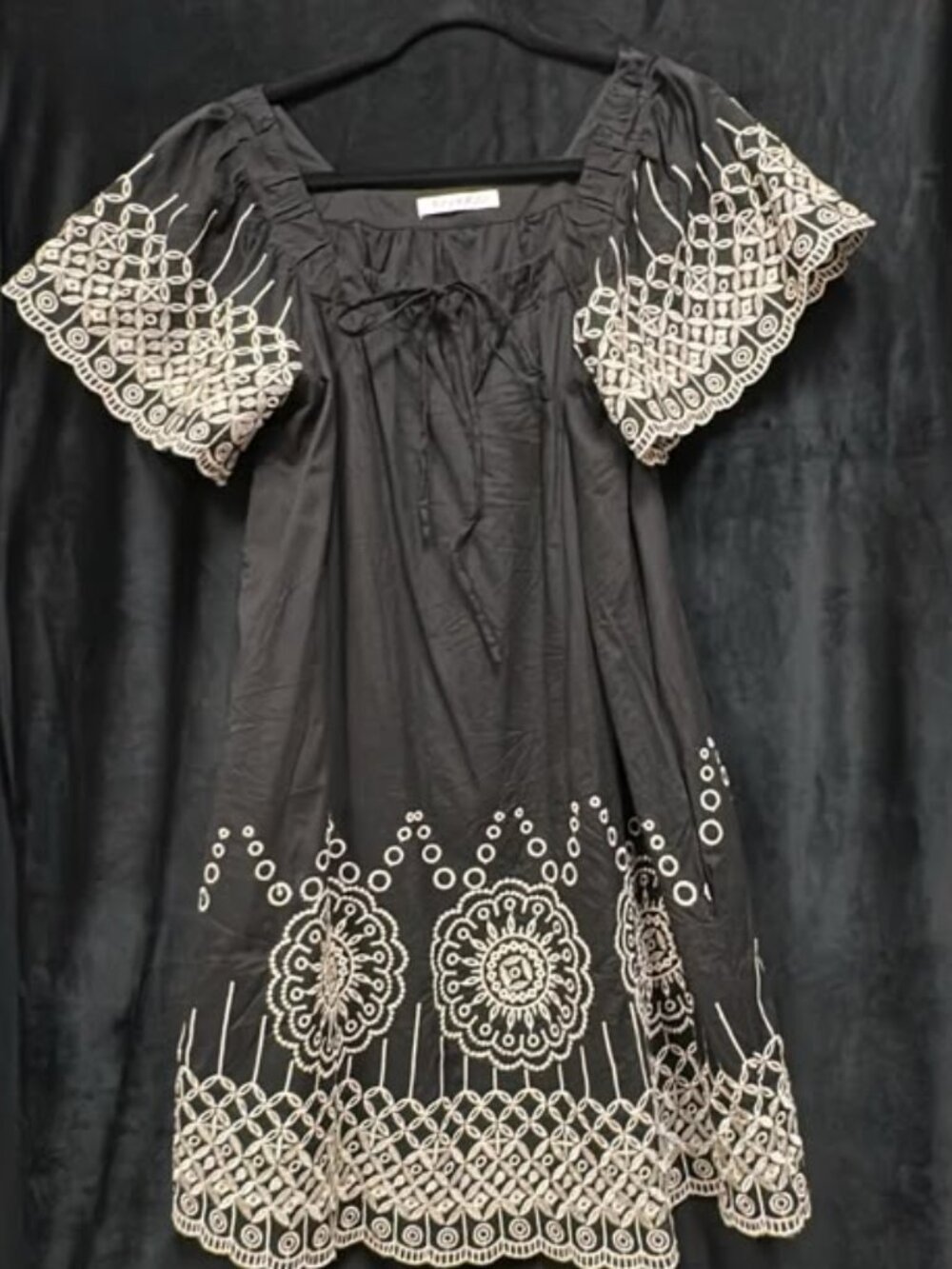 Black and cream embroidery dress